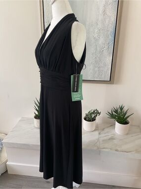 **JONES WEAR DRESS** Gorgeous Black  “Day  to Dinner” with plunging neckline.